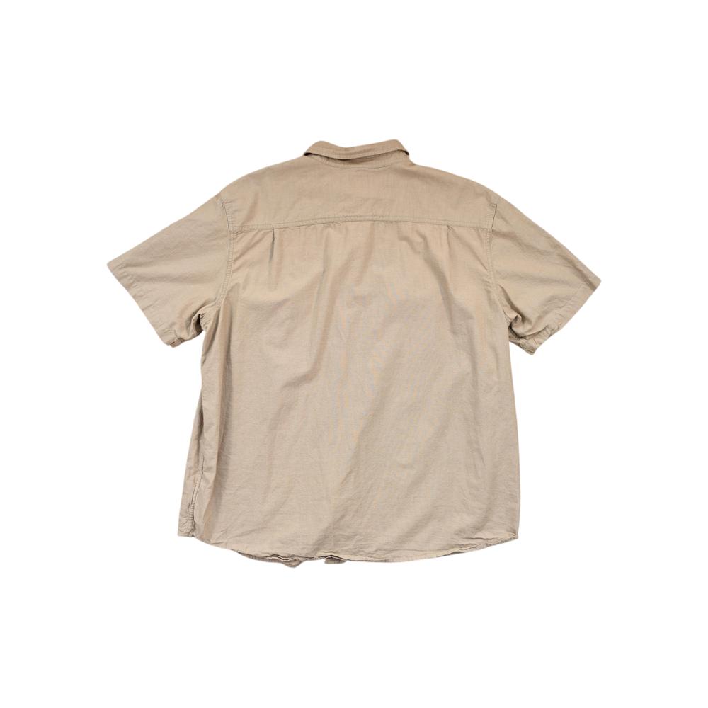 Tan button-up shirt by Carhartt, seen from the back, with short sleeves.