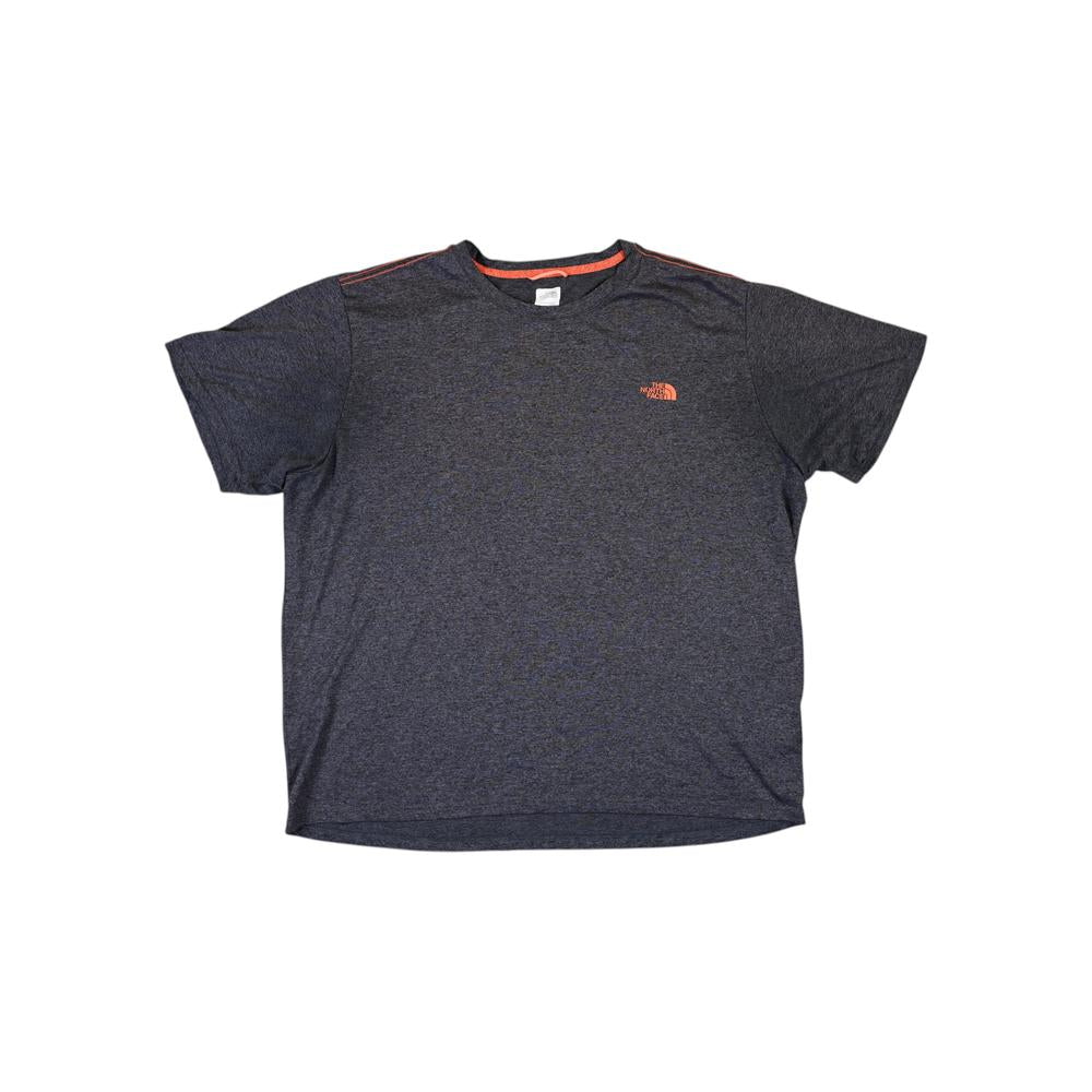 Gray athletic shirt by The North Face with orange accents at the collar and shoulders.