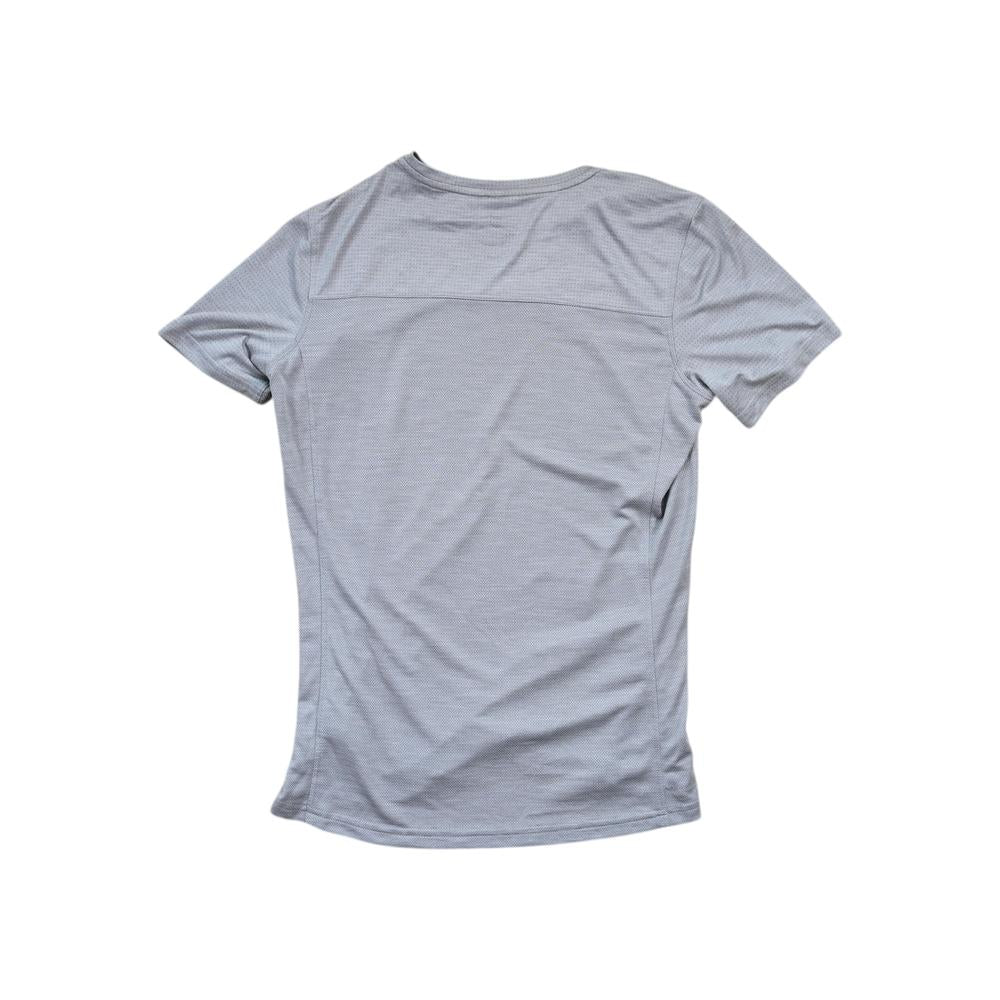 Gray active shirt by Kuhl with a subtle textured pattern, short sleeves, and a crew neck, shown from the back.