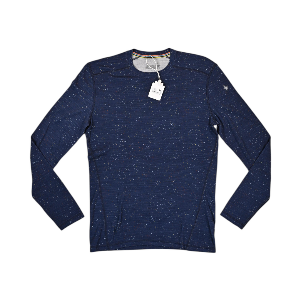 Navy speckled donegal-pattern crew neck baselayer by Smartwool, laid flat with hangtag attached.