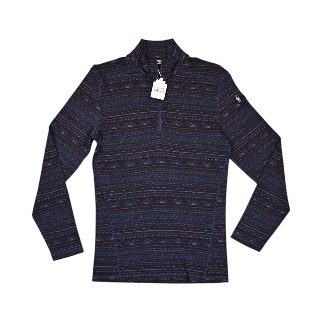 Navy fair-isle patterned quarter-zip baselayer by Smartwool, laid flat with hangtag attached.