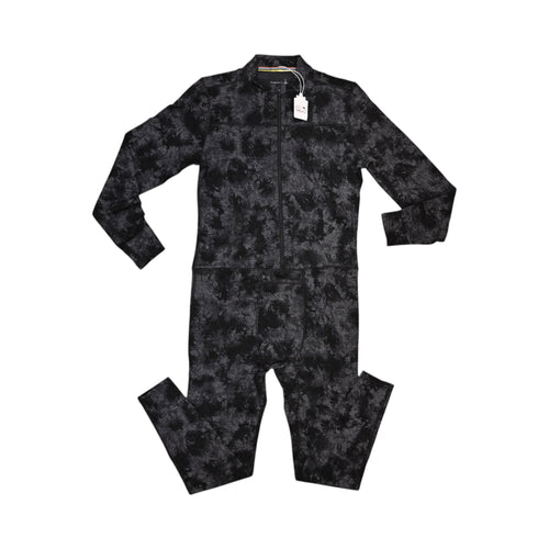 Black tie-dye Merino one-piece base layer by Smartwool, front view with the half-zip open at the neck.