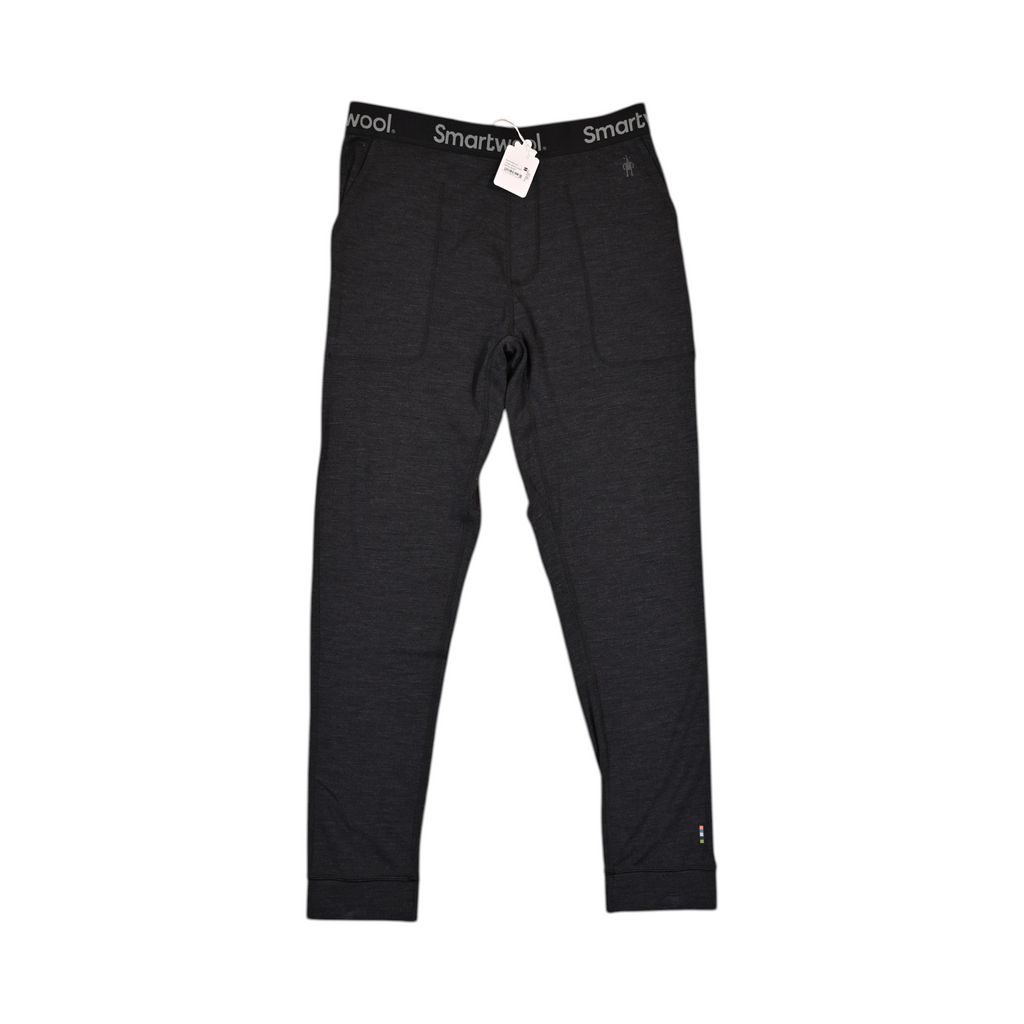 Charcoal Heather Merino jogger pants by Smartwool, laid flat with hand pockets and elastic cuffs visible.