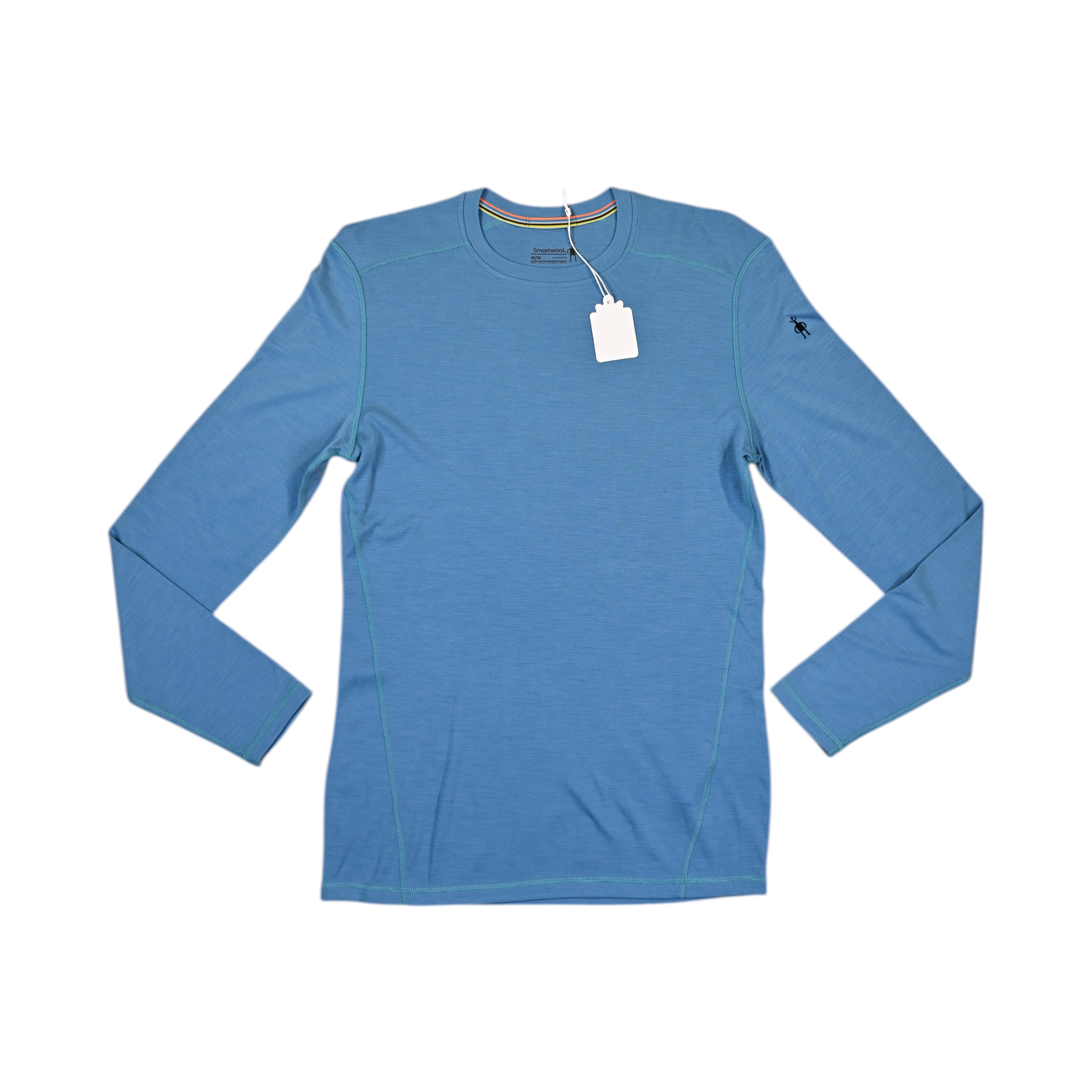 Cornflower blue heather crew neck baselayer by Smartwool, laid flat with hangtag attached.