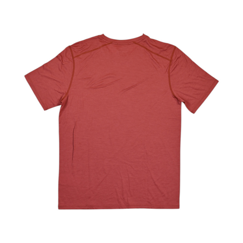 Detail view of a heathered brick-red Smartwool short sleeve tee showing the sleeve and hem.