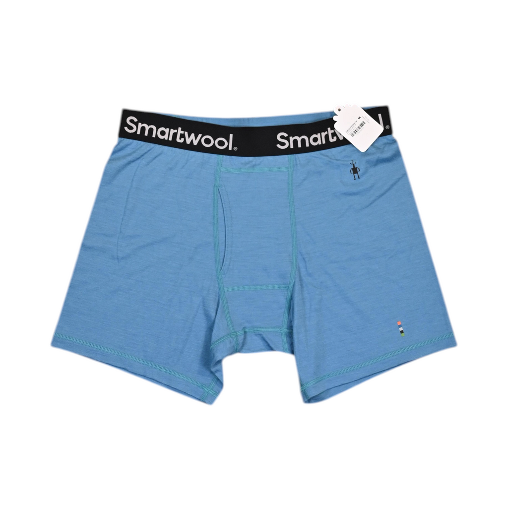 Medium heathered blue Smartwool boxer brief laid flat, showing the waistband and front seam.
