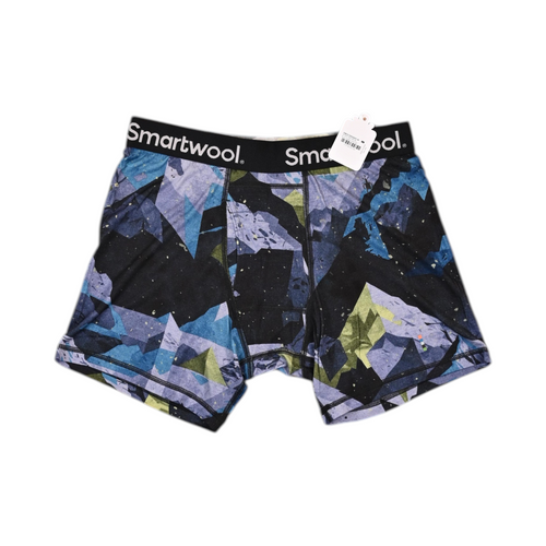 Blue and black geometric print Smartwool boxer brief laid flat, showing the waistband and front seam.