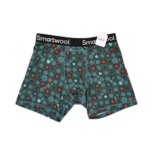 Teal geo-floral print Smartwool boxer brief laid flat, showing the waistband and front seam.
