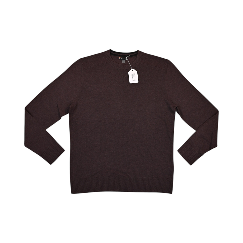 Deep burgundy-brown Smartwool crew sweater laid flat, showing the crew neck and front.