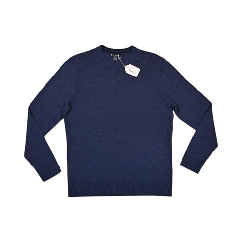 Navy blue Smartwool crew sweater laid flat, showing the crew neck and front.