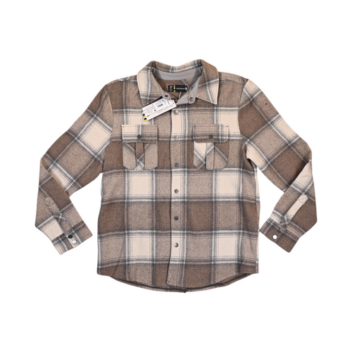 Tan and cream plaid Smartwool shirt jacket laid flat, showing the snap-button chest pockets.