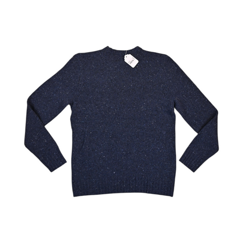 Back of a flecked navy Smartwool crew sweater laid flat.