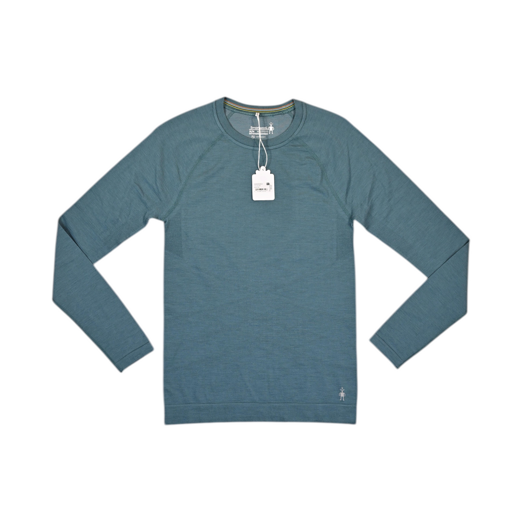 Heathered teal Smartwool base layer crew top laid flat, showing the front.