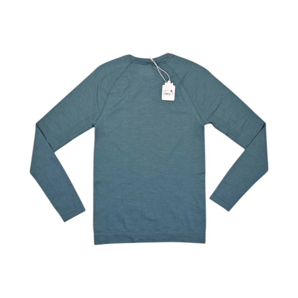 Detail view of a heathered teal Smartwool base layer crew top.