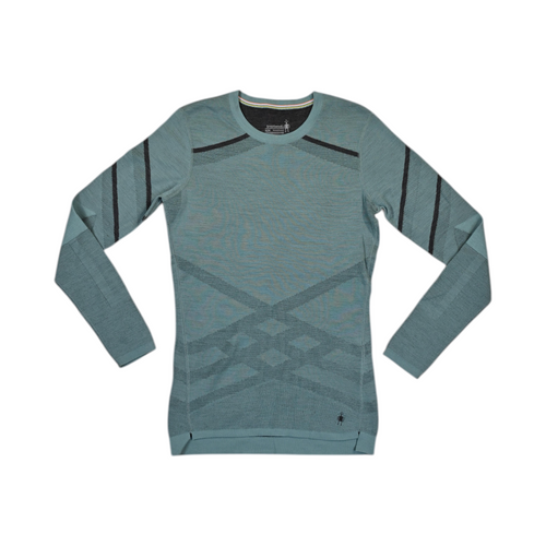 Teal Smartwool crew top laid flat, showing dark diagonal stripe accents.