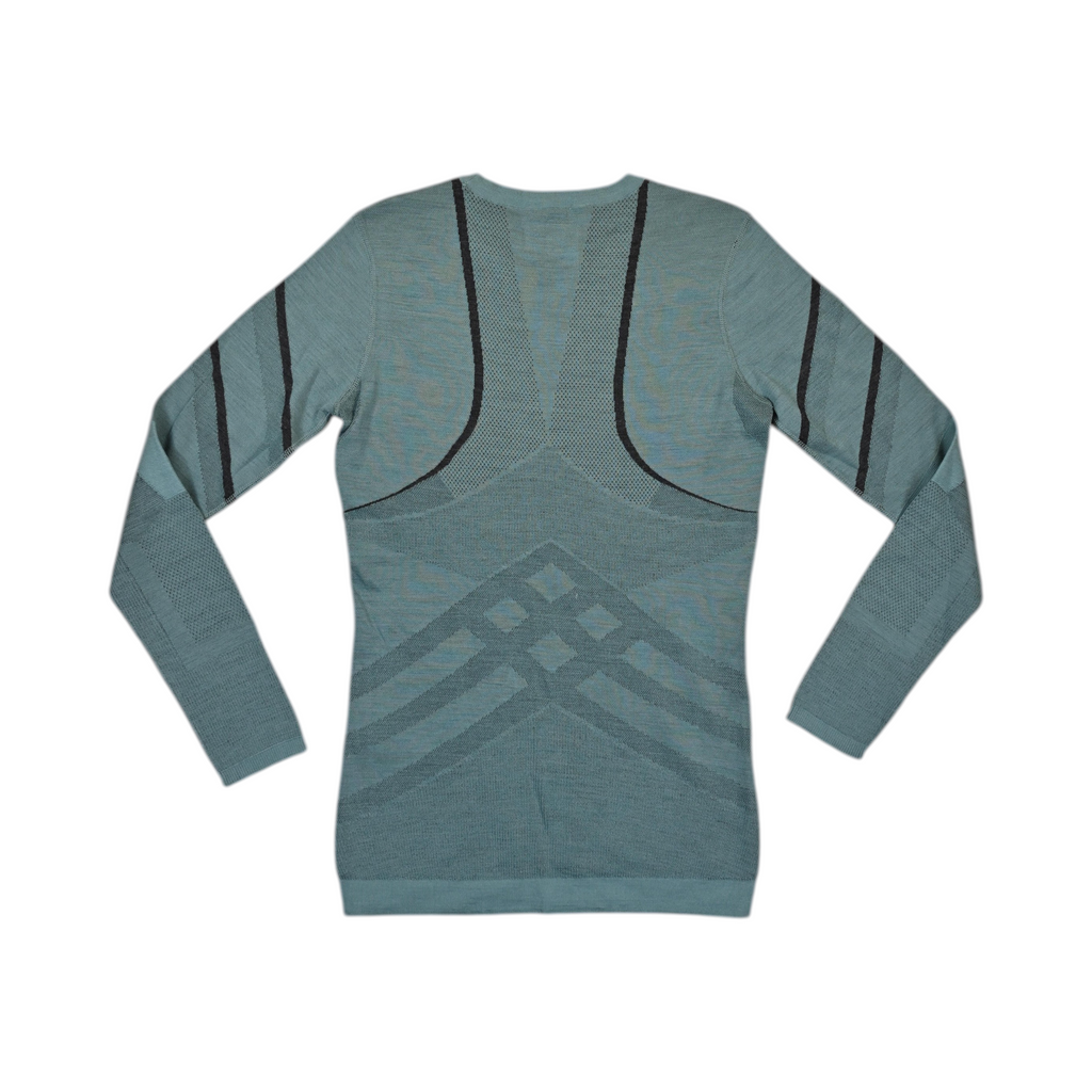 Detail view of a teal Smartwool crew top with diagonal stripe accents.