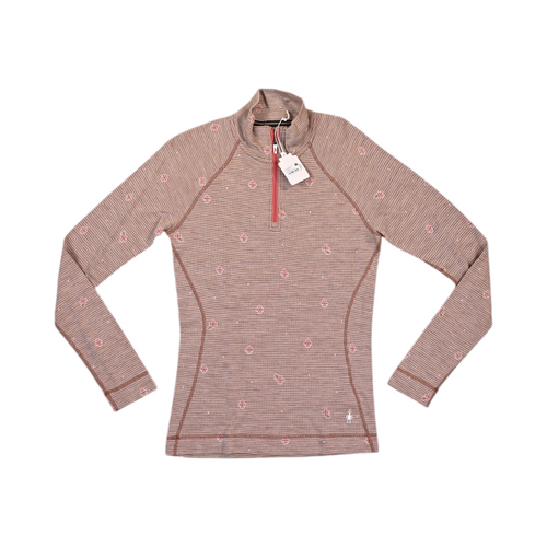 Tan floral houndstooth print Smartwool quarter-zip top laid flat.
