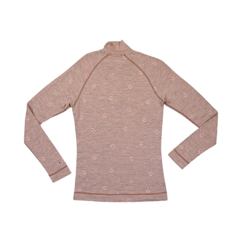 Detail view of a tan floral houndstooth print Smartwool quarter-zip top.