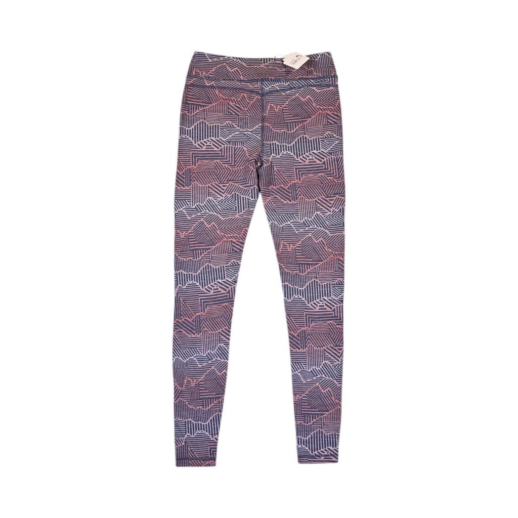 Detail view of navy and coral linear print Smartwool base layer leggings.
