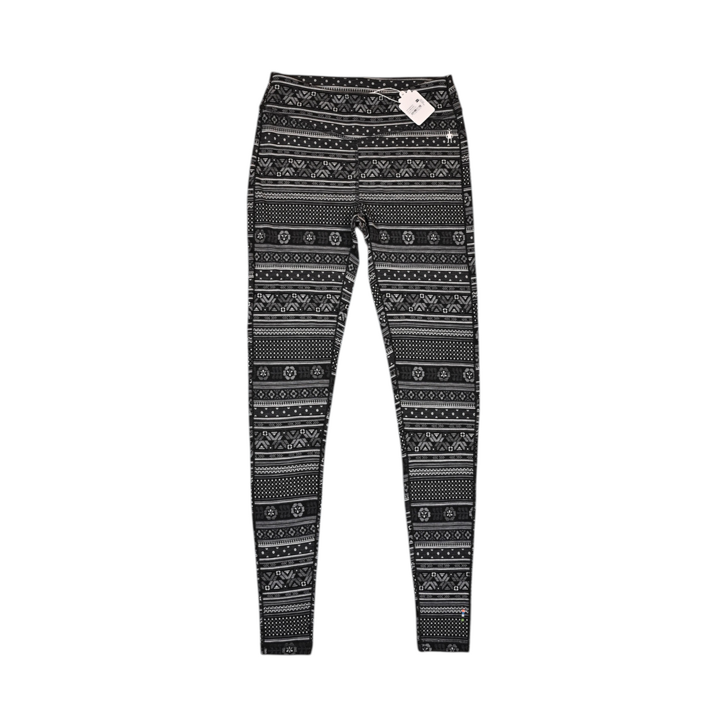 Black and white fair-isle print Smartwool base layer leggings laid flat.