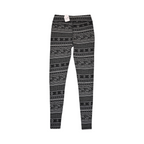 Detail view of black and white fair-isle print Smartwool base layer leggings.