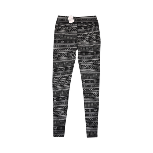 Detail view of black and white fair-isle print Smartwool base layer leggings.