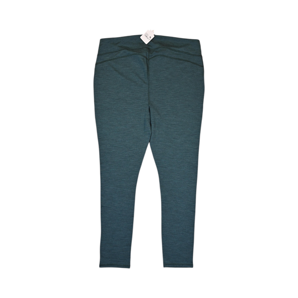 Detail view of deep teal-green Smartwool base layer leggings, plus size.
