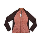 Coral and brown Smartwool hybrid jacket laid flat, showing the quilted front panel and fleece sleeves.