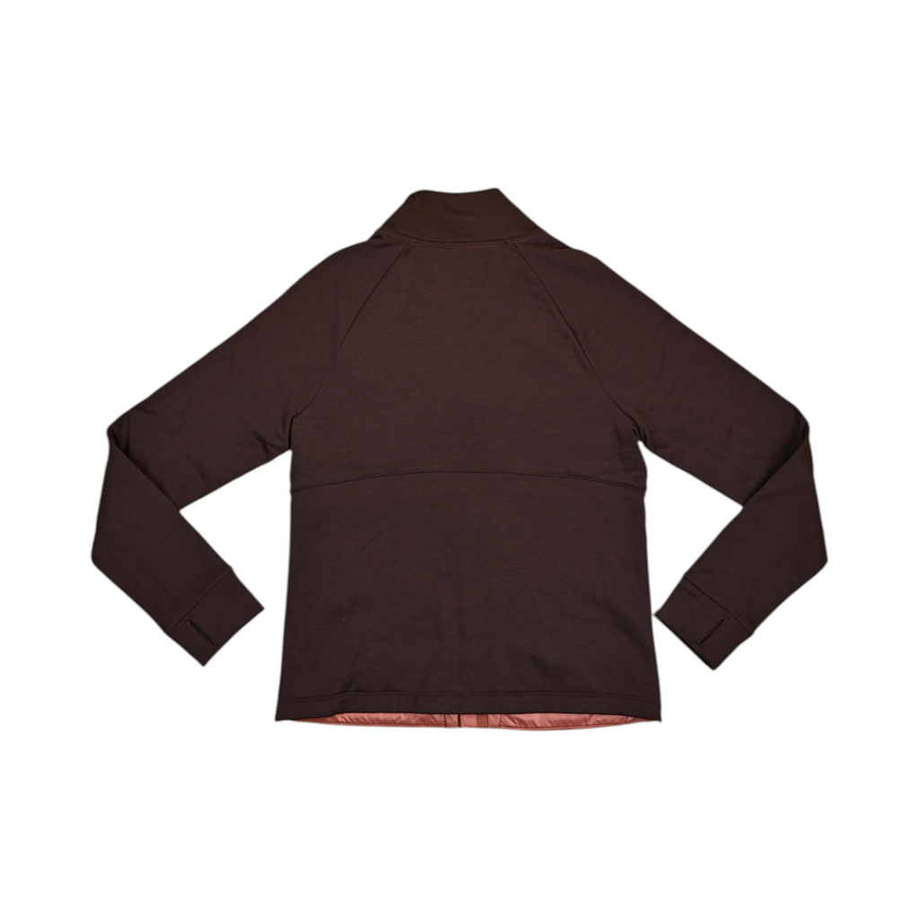 Back of a coral and brown Smartwool hybrid jacket laid flat.