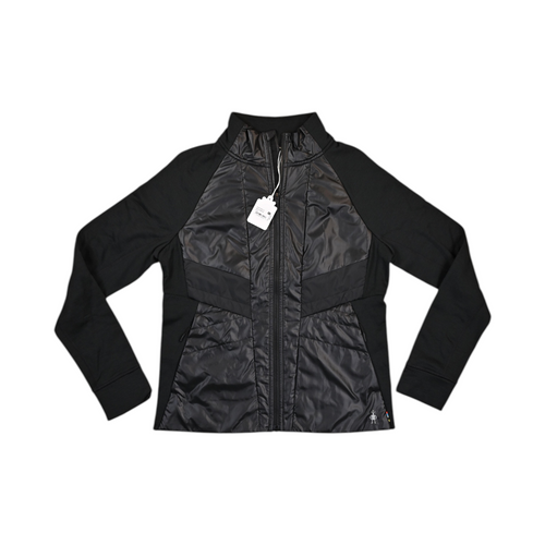 Black Smartwool hybrid jacket laid flat, showing the quilted front panel and fleece sleeves.