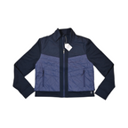 Navy colorblock Smartwool cropped jacket laid flat, showing the quilted front panel.