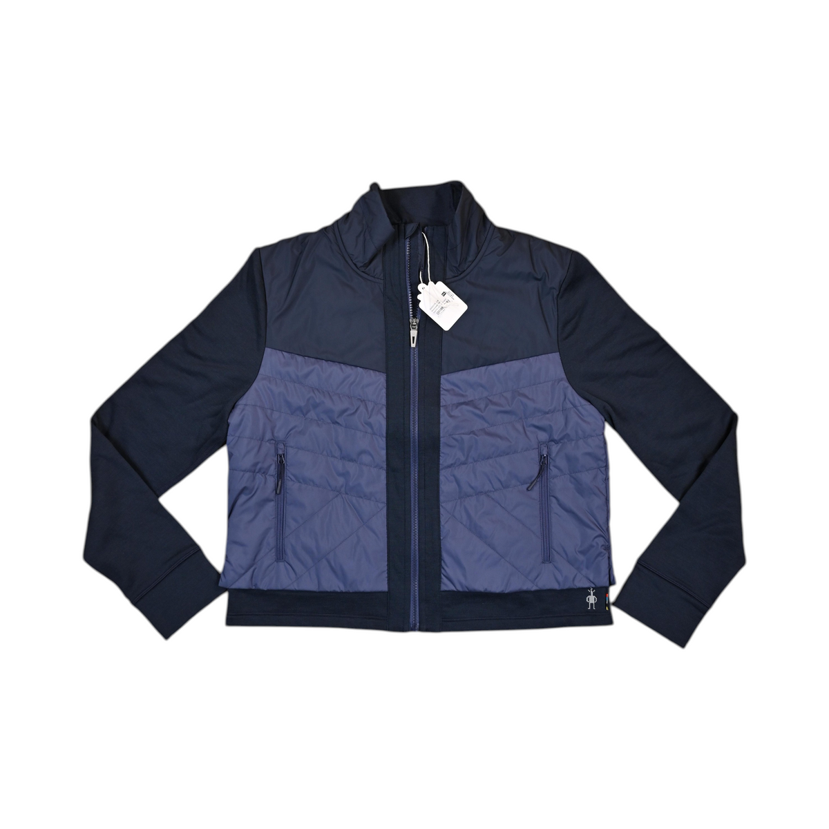 Navy colorblock Smartwool cropped jacket laid flat, showing the quilted front panel.