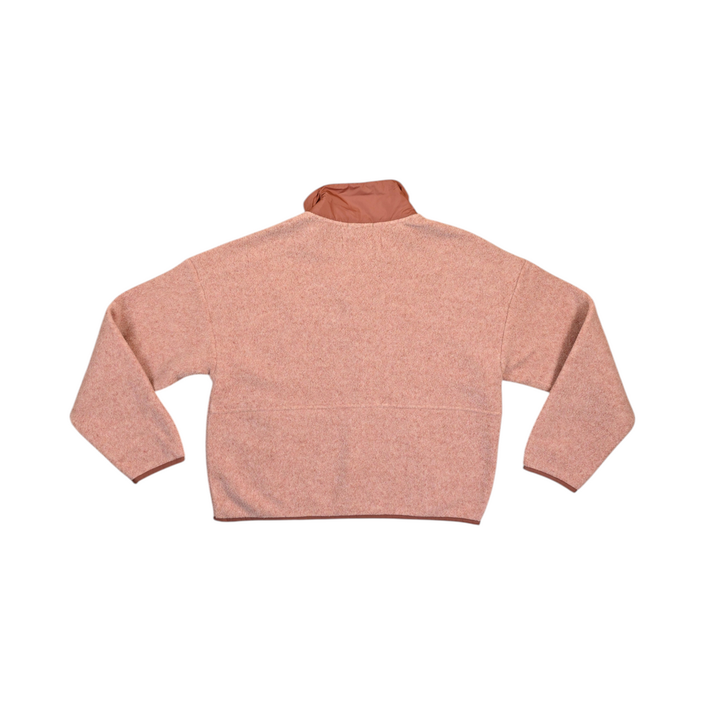 Back of a dusty pink Smartwool cropped fleece pullover laid flat.