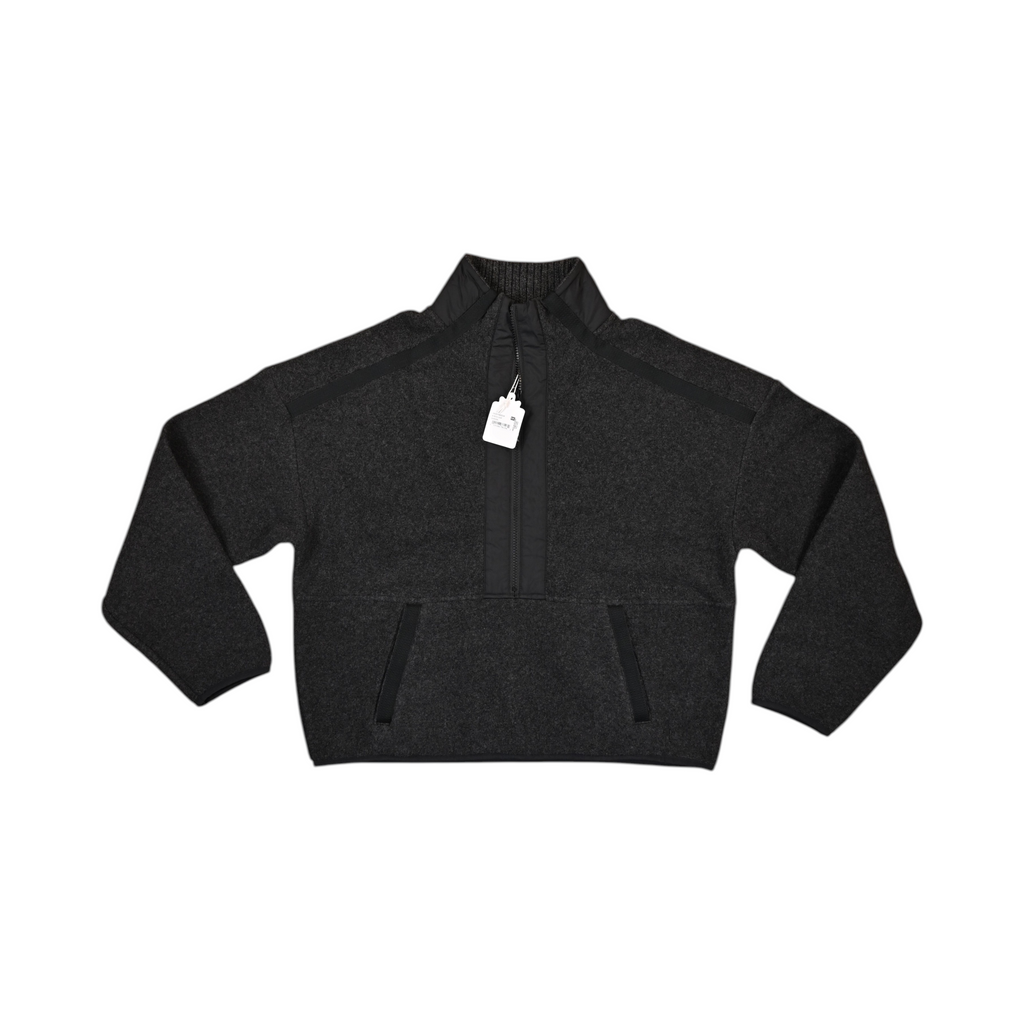 Charcoal Smartwool cropped fleece pullover laid flat, showing the quarter-zip and pockets.