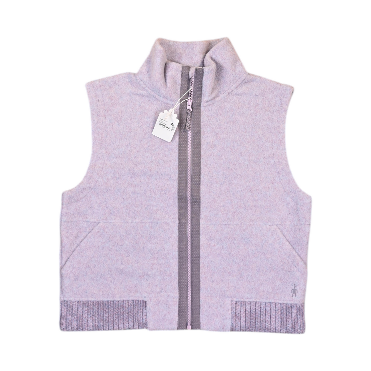 Pale flecked lilac Smartwool fleece vest laid flat, showing the zip front and pockets.