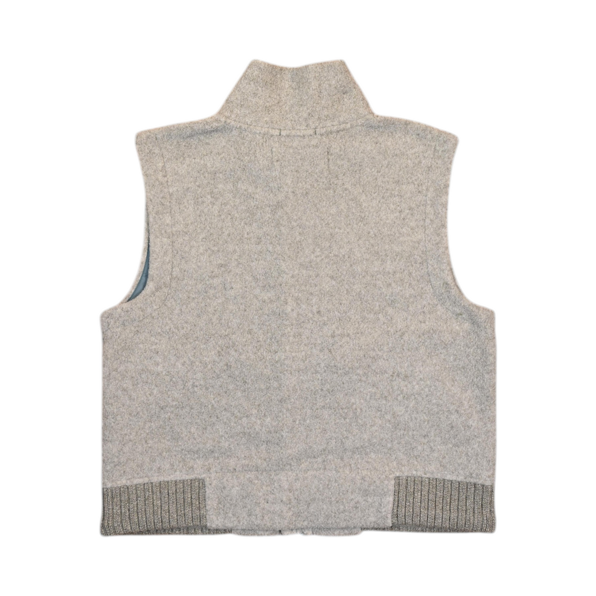 Back of a light oatmeal-grey Smartwool fleece vest laid flat.