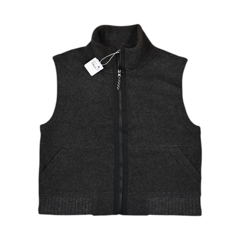 Charcoal Smartwool fleece vest laid flat, showing the zip front and pockets.