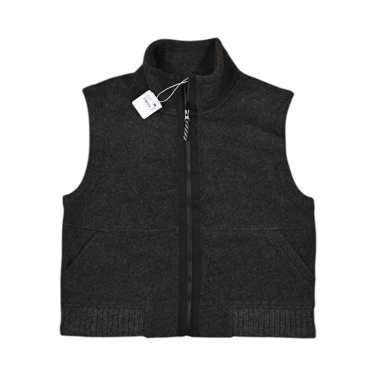 Charcoal Smartwool fleece vest laid flat, showing the zip front and pockets.