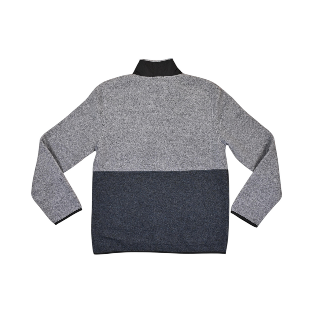 Back of a grey and navy colorblock Smartwool fleece quarter-zip laid flat.