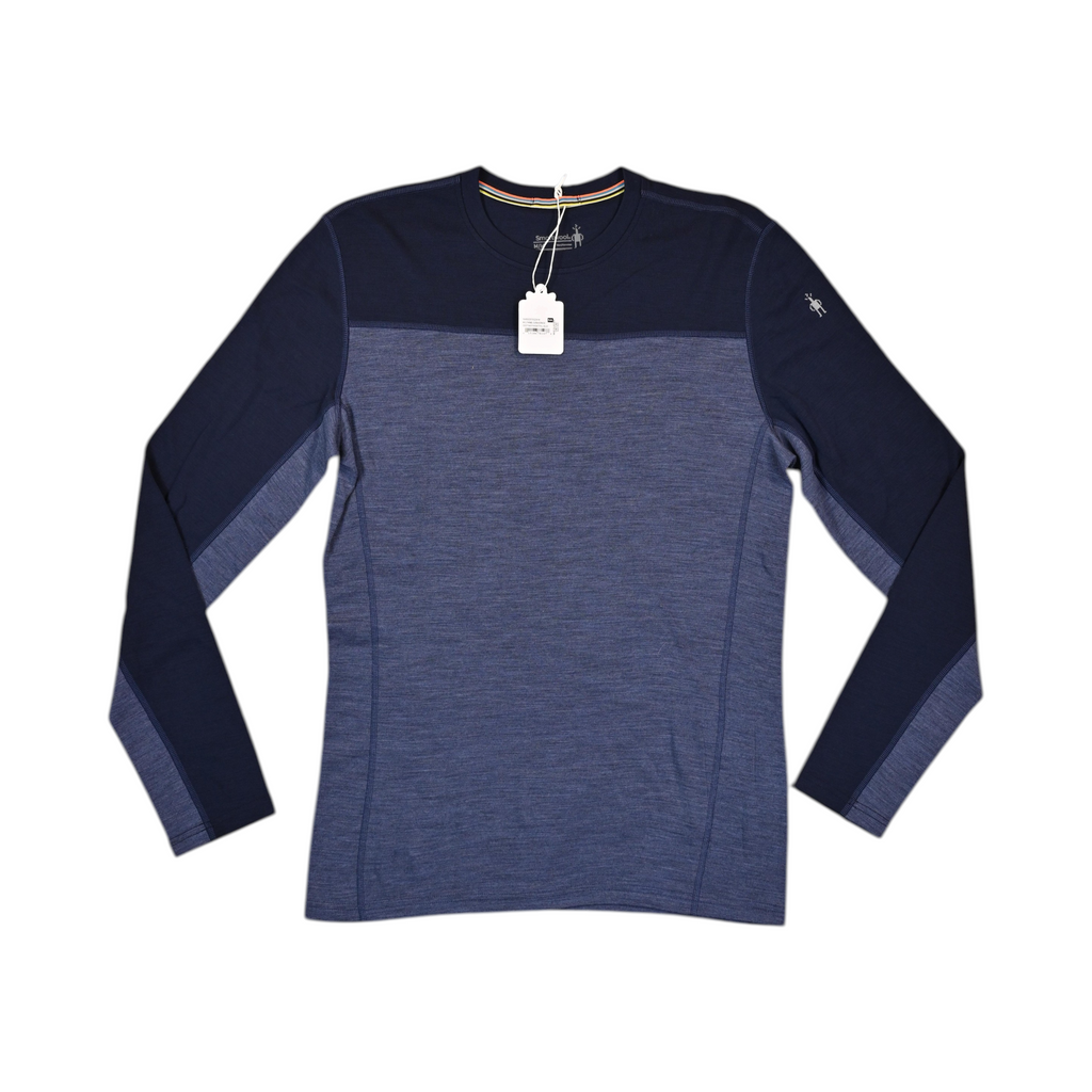 Colorblock baselayer crew by Smartwool in navy and heathered blue, laid flat.