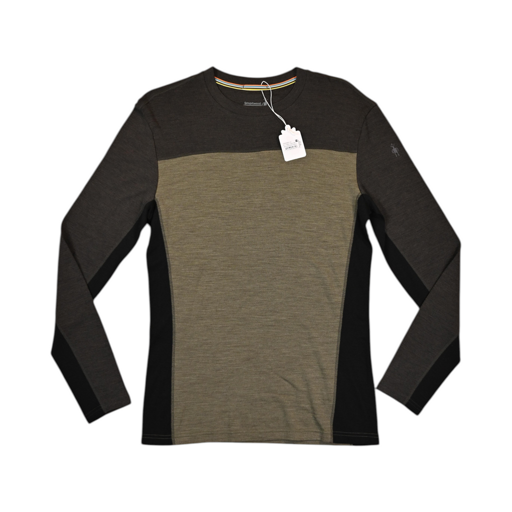 Colorblock baselayer crew by Smartwool with charcoal shoulders, olive body, and black side panels, laid flat.