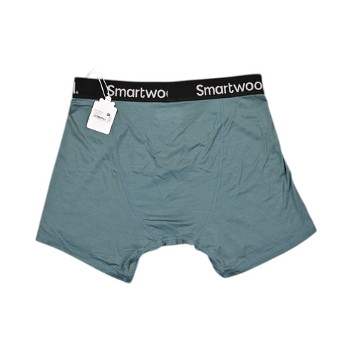 Back view of a teal Smartwool boxer brief laid flat, showing the waistband and rear seam.