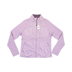 Pale lilac Smartwool hybrid jacket laid flat, showing the quilted front panel and fleece sleeves.
