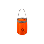 Red folding bucket by Sea to Summit with gray trim and a carrying handle.