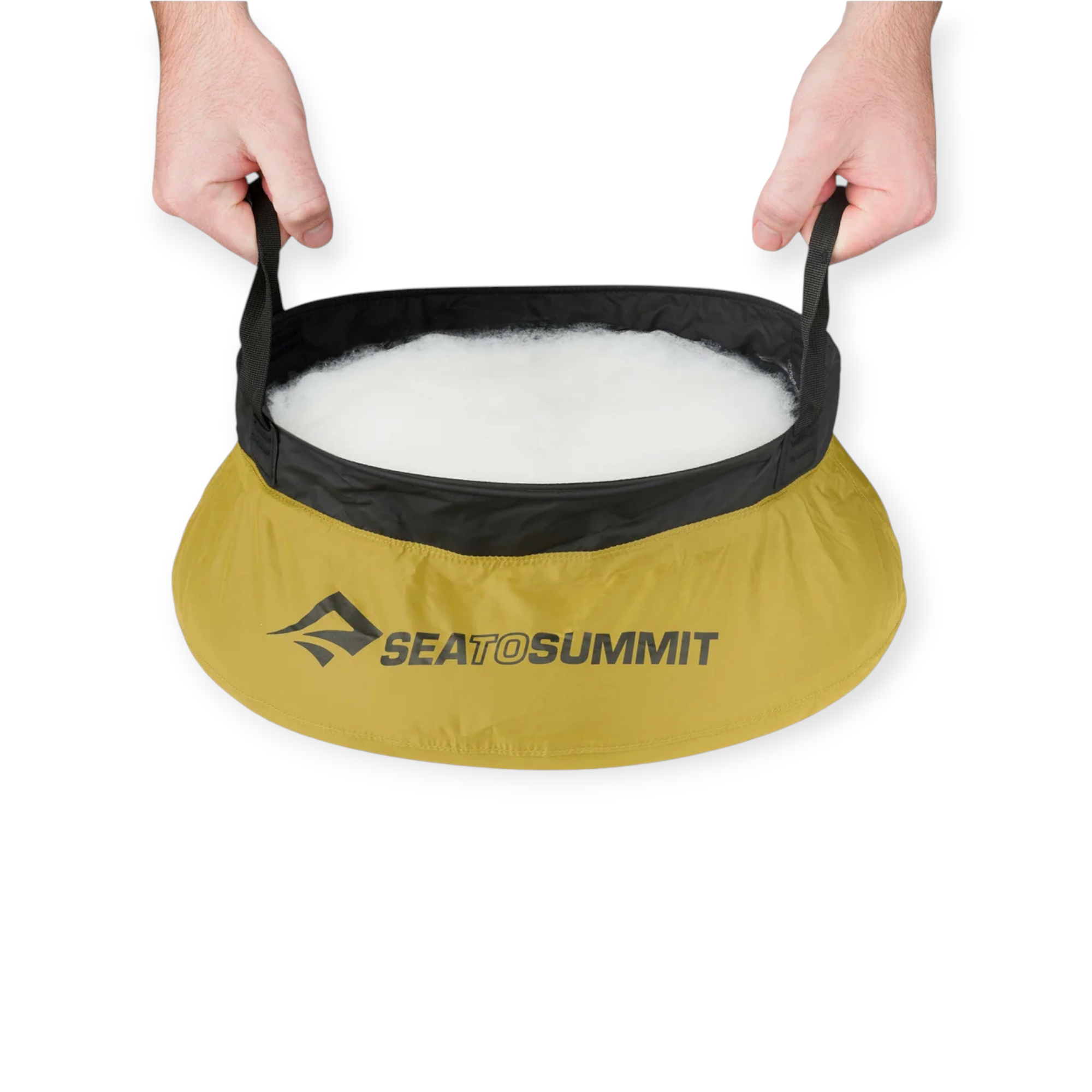 Green camp kitchen clean-up kit by Sea to Summit, held by two hands and filled with soapy water.