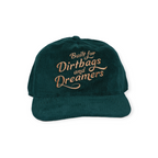Green corduroy hat by FERAL with an embroidered text graphic on the front.