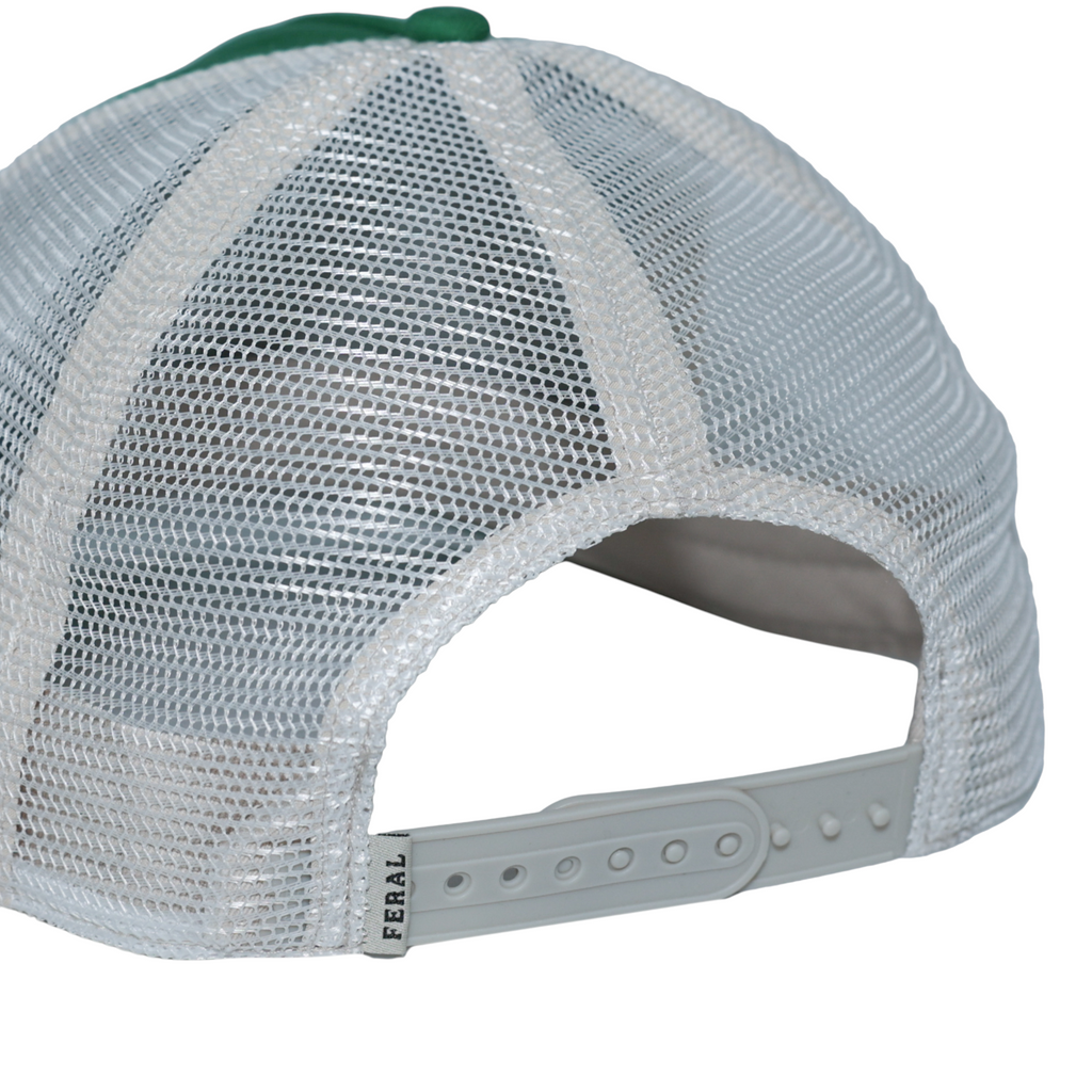 Back view of a mesh trucker hat by FERAL with a green brim and white adjustable strap.
