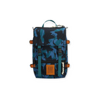 Blue and black camo backpack by Topo Designs with green straps and brown hardware.