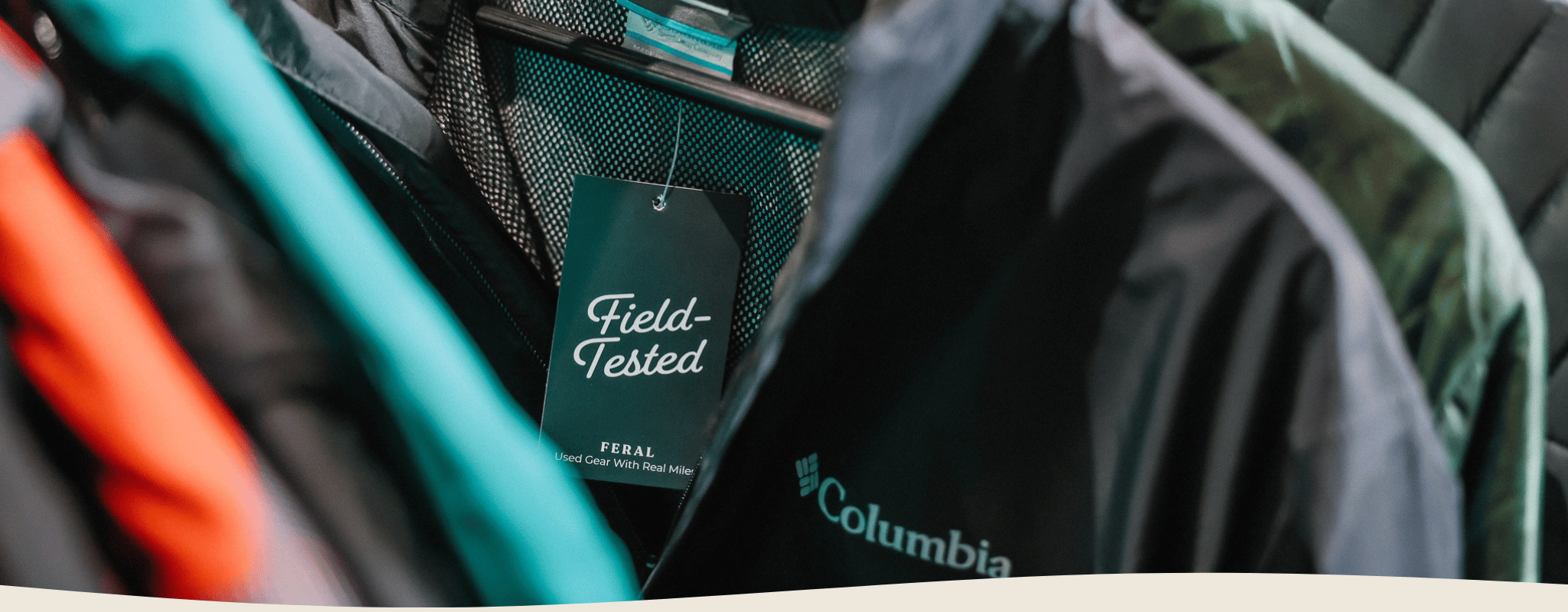 Columbia jacket with a 'Field Tested' tag on a blurred background
