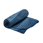 Blue Drylite towel by Sea to Summit, partially rolled up with light blue stripes and a textured hem.